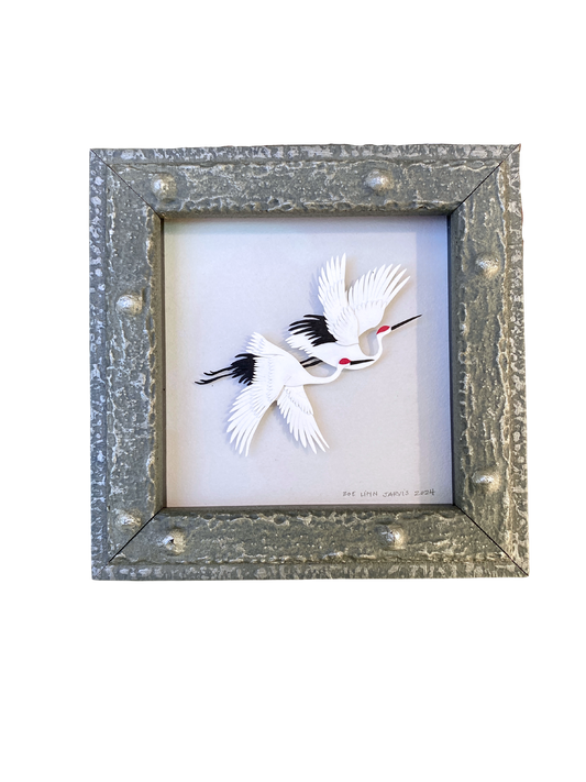 Red-Crowned Cranes Flying